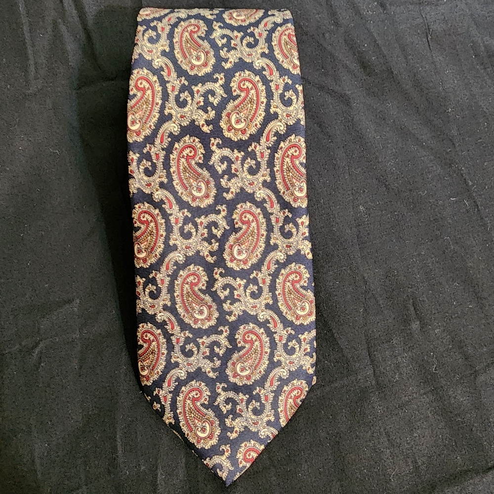 Vintage Oleg Cassini Tie,  no materials listed.  Maroon on black, 56x3 skinny